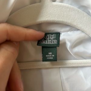 Target white puffer XS - small stain on sleeve